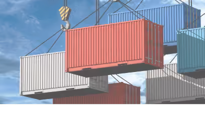 Contenedor de carga siendo levantado por una grúa, representando el trading de futuros